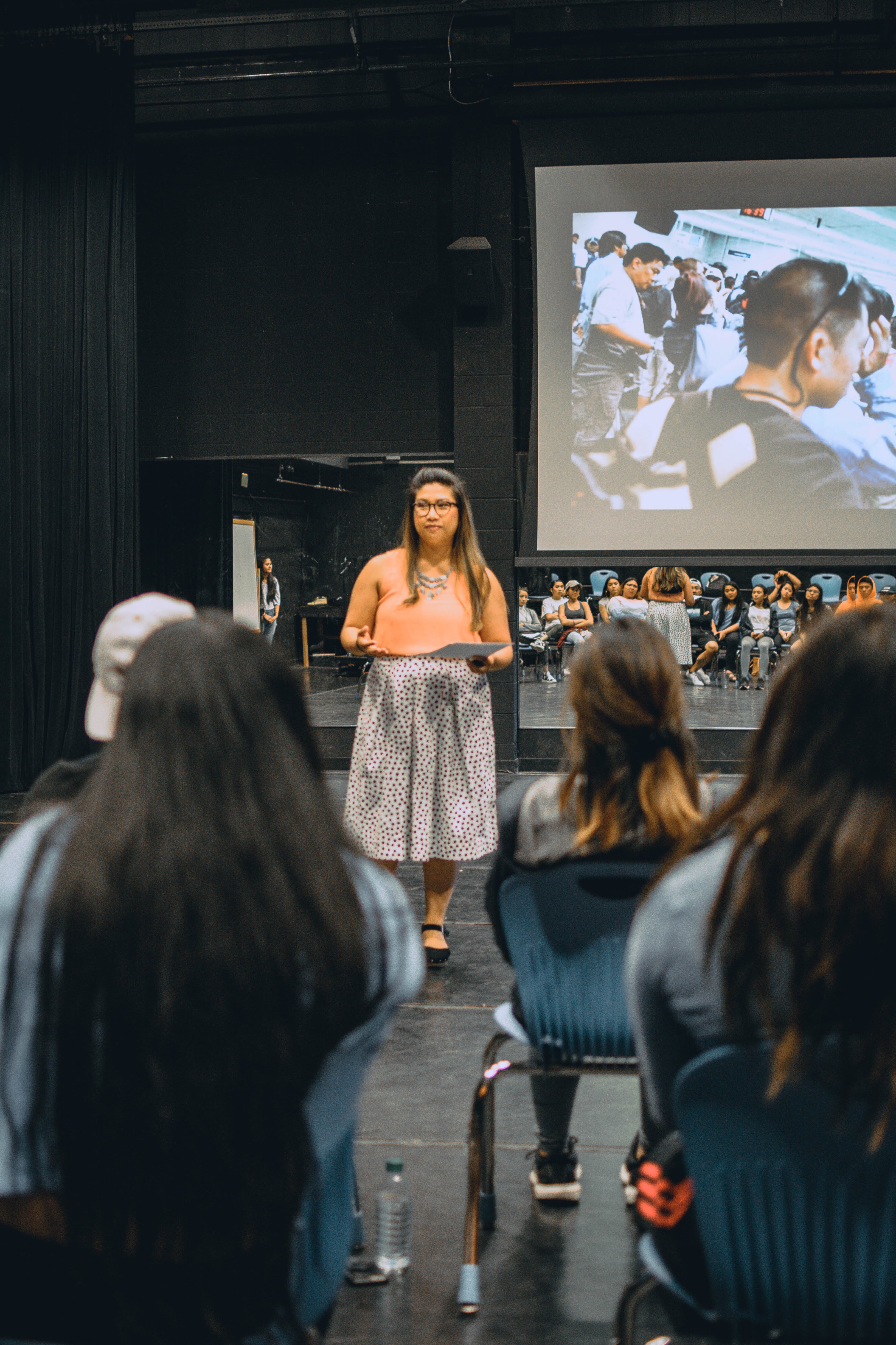 Photo credit: John Tolang Image description: VFM standing and addressing group of students 